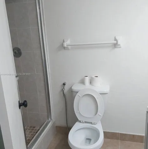 a bathroom with a toilet and a sink
