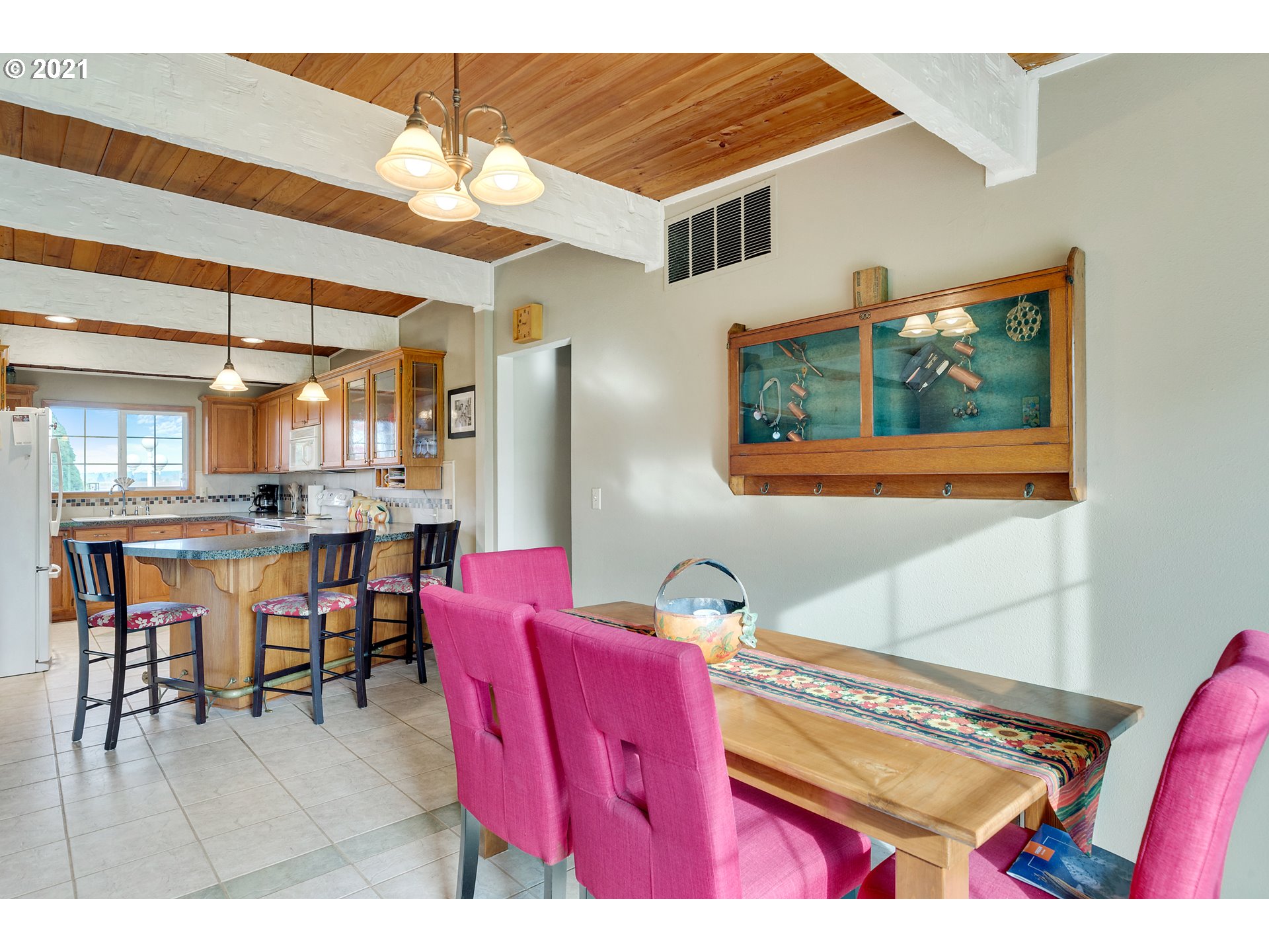 7320 South Mark Road Canby, OR 97013 - Photo 12 of 28 a dining room with furniture and a floor to ceiling window