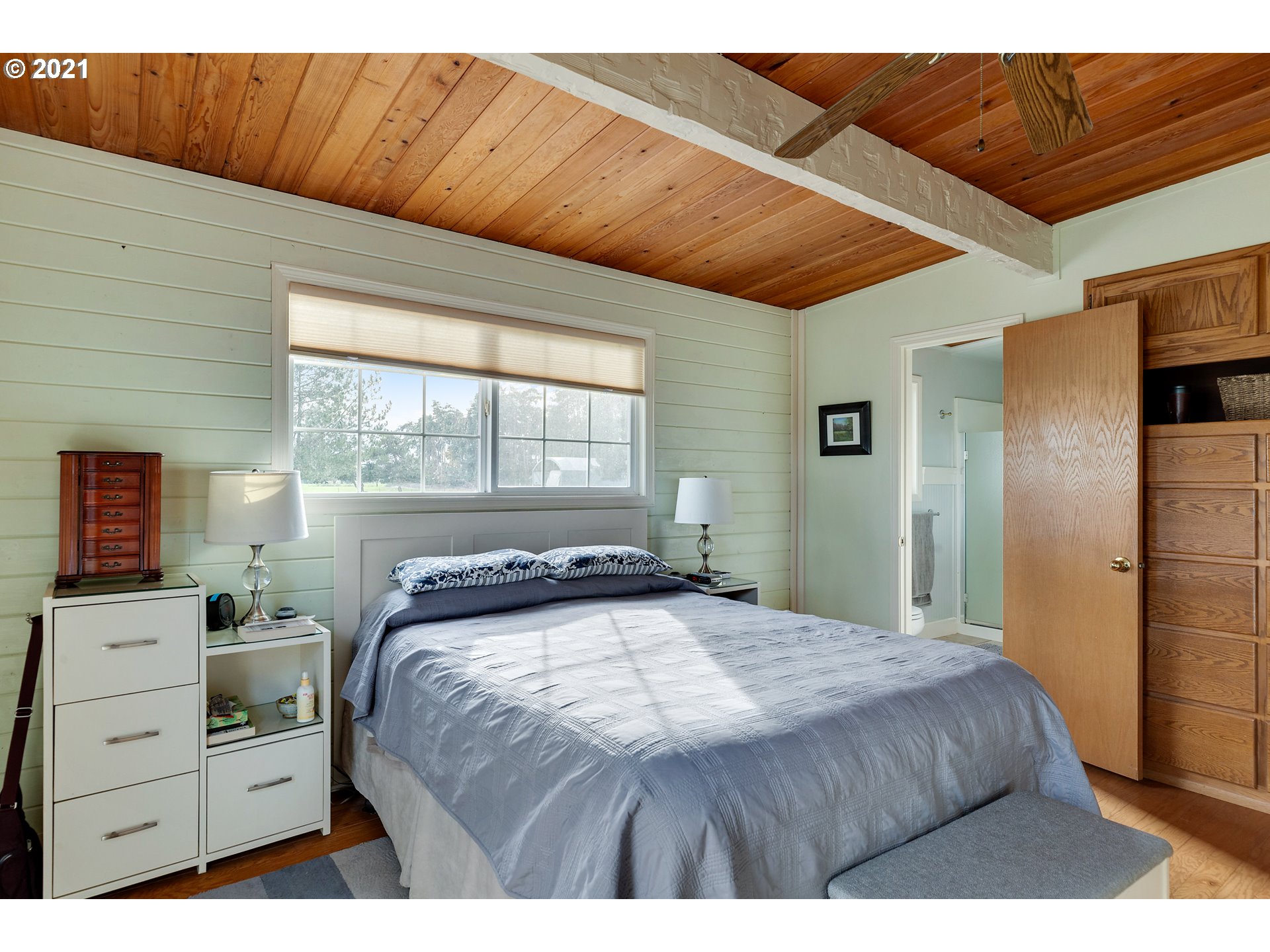 7320 South Mark Road Canby, OR 97013 - Photo 15 of 28 a bedroom with a bed and a window