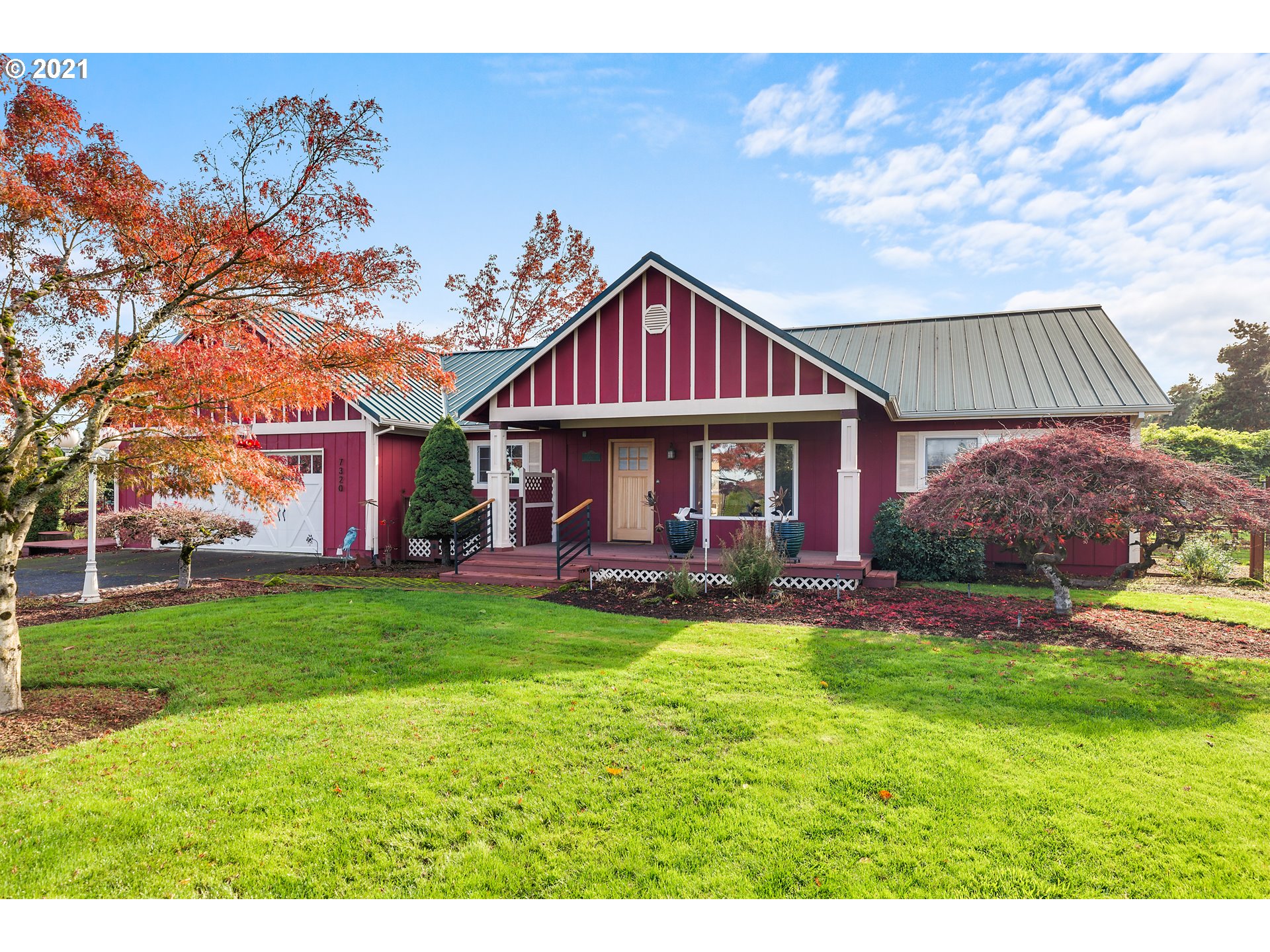 7320 South Mark Road Canby, OR 97013 - Photo 3 of 28 a view of a house with a yard and sitting area