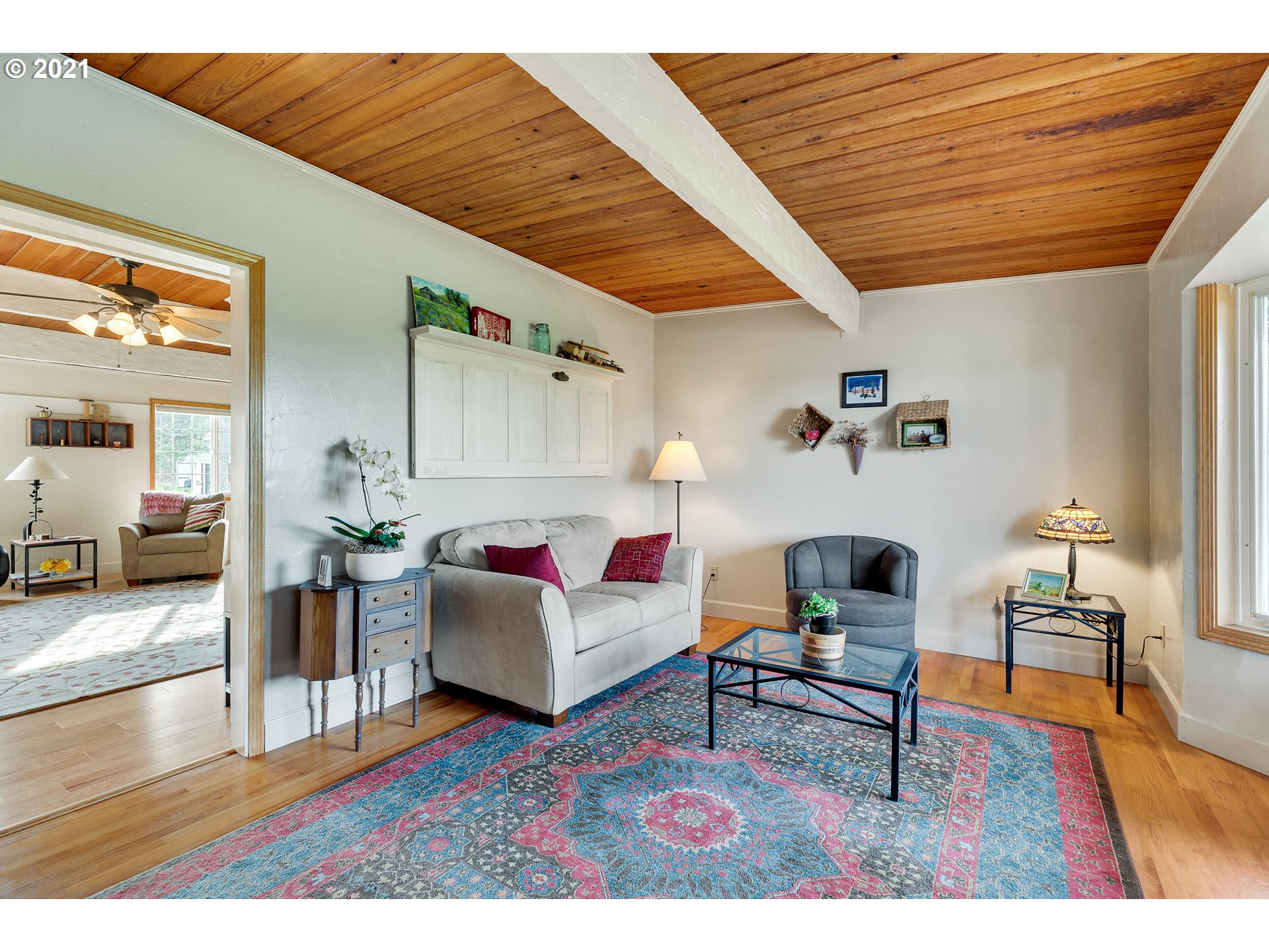 7320 South Mark Road Canby, OR 97013 - Photo 5 of 28 a living room with furniture and a wooden floor
