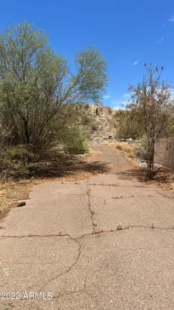 a view of beach and mountain