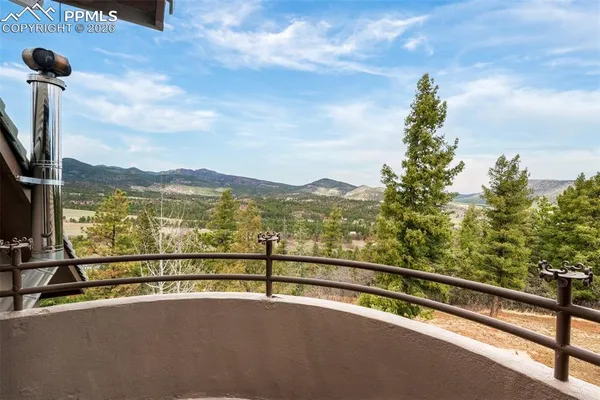 a view of mountain view from a balcony