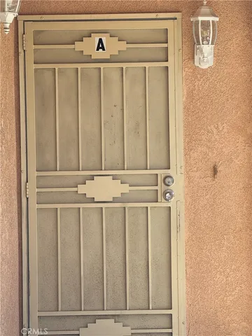 a close view of a utility room with dryer and washer