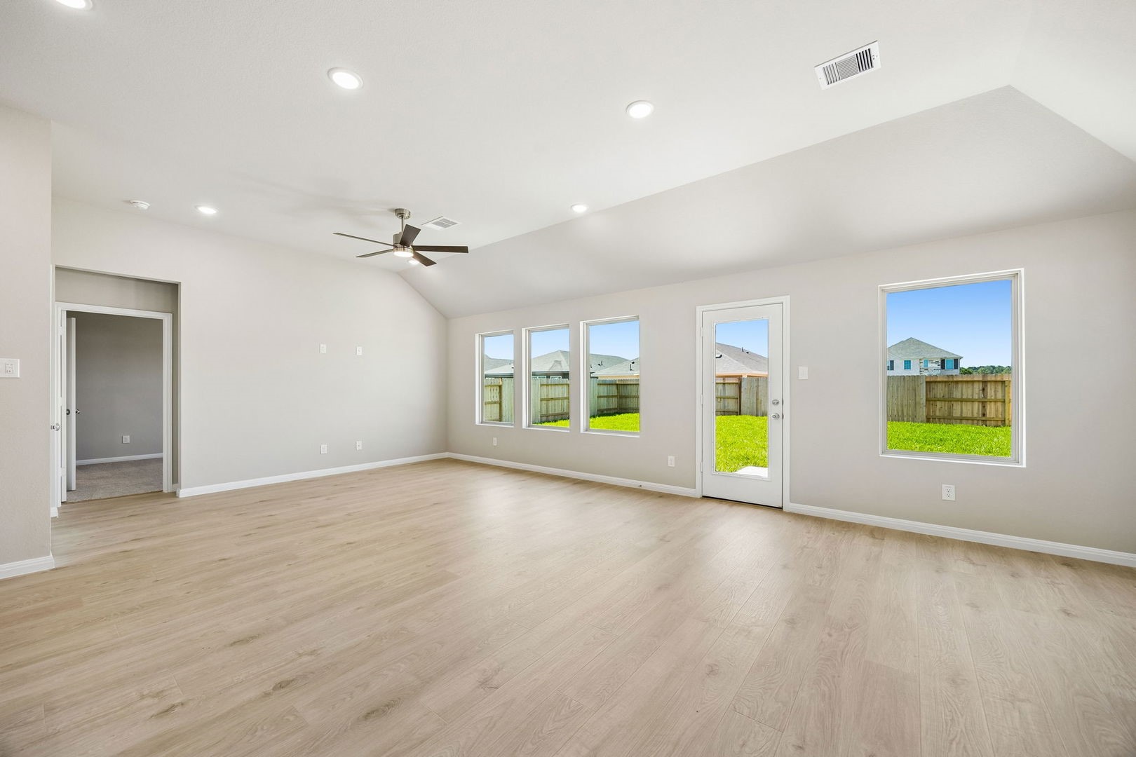 31108 Rena Coast Drive Huffman, TX 77336 - Photo 6 of 30 Living Room in the Sabine home plan by Trophy Signature Homes – REPRESENTATIVE PHOTO