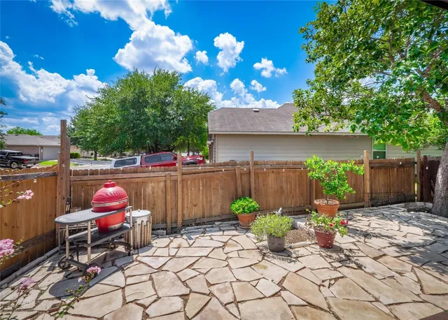 a garden view with a seating space