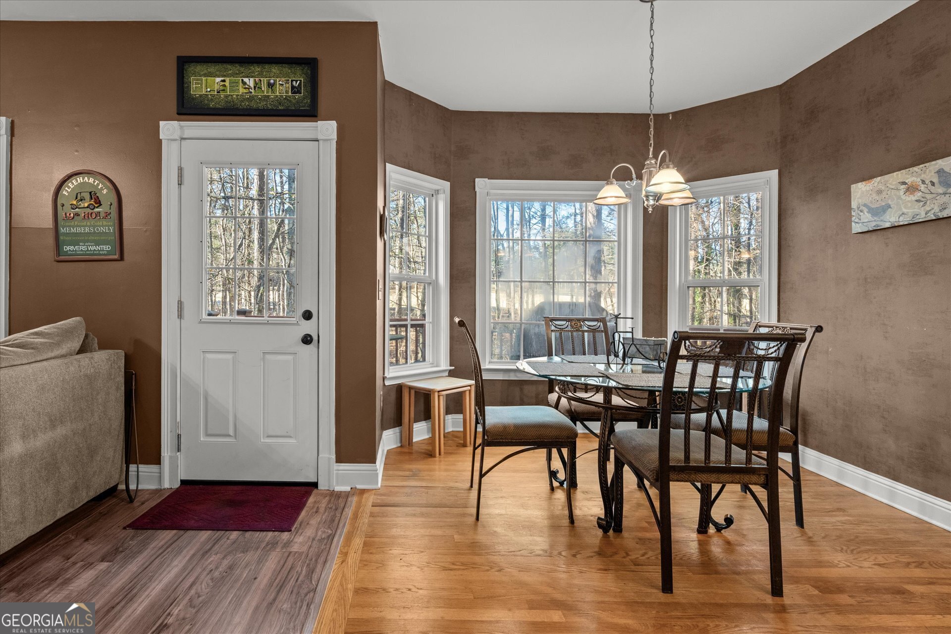 4051 Golfview Court Villa Rica, GA 30180 - Photo 12 of 77 a view of a dining room with furniture window and wooden floor