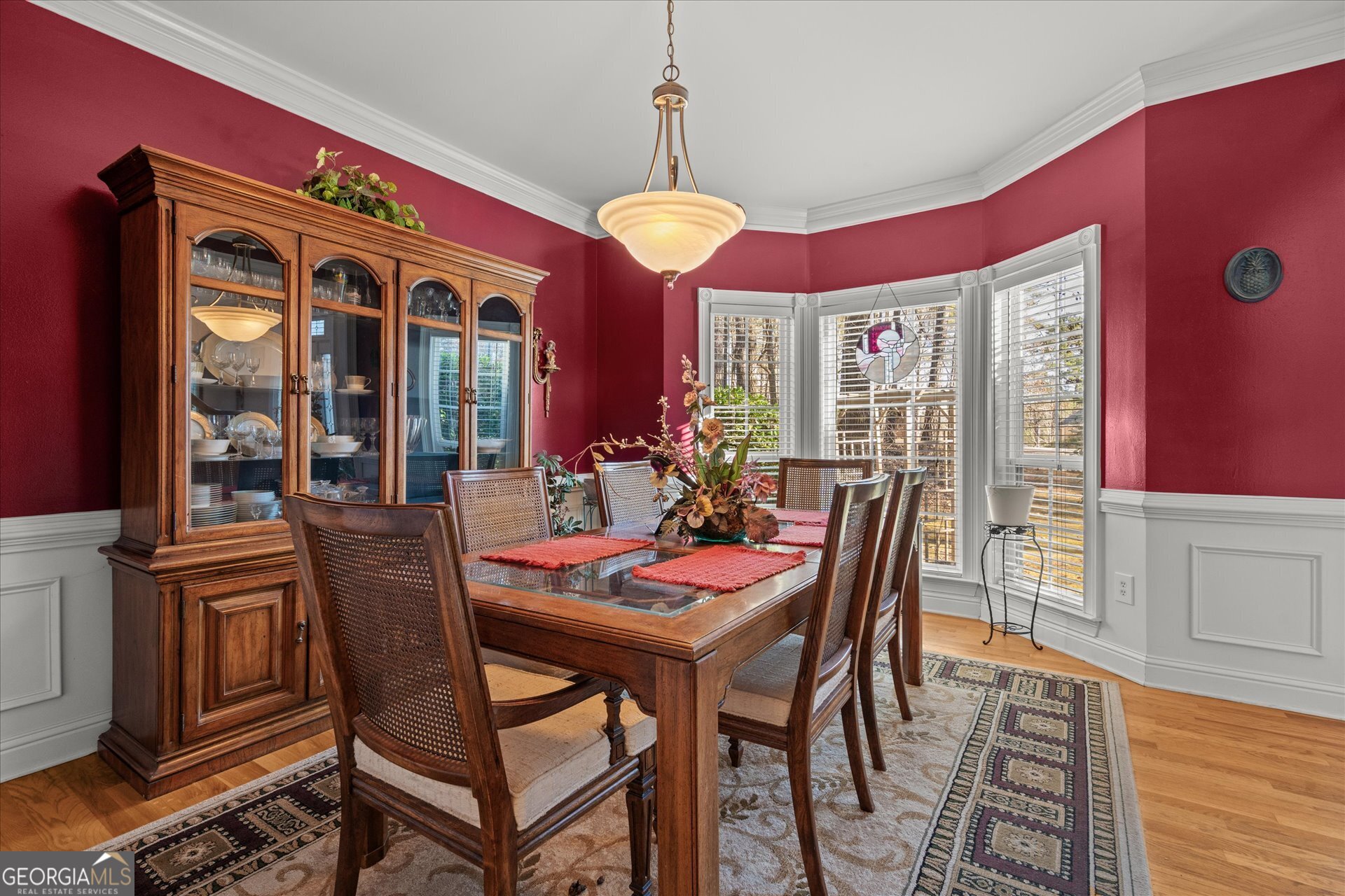 4051 Golfview Court Villa Rica, GA 30180 - Photo 19 of 77 a view of a dining room with furniture and chandelier
