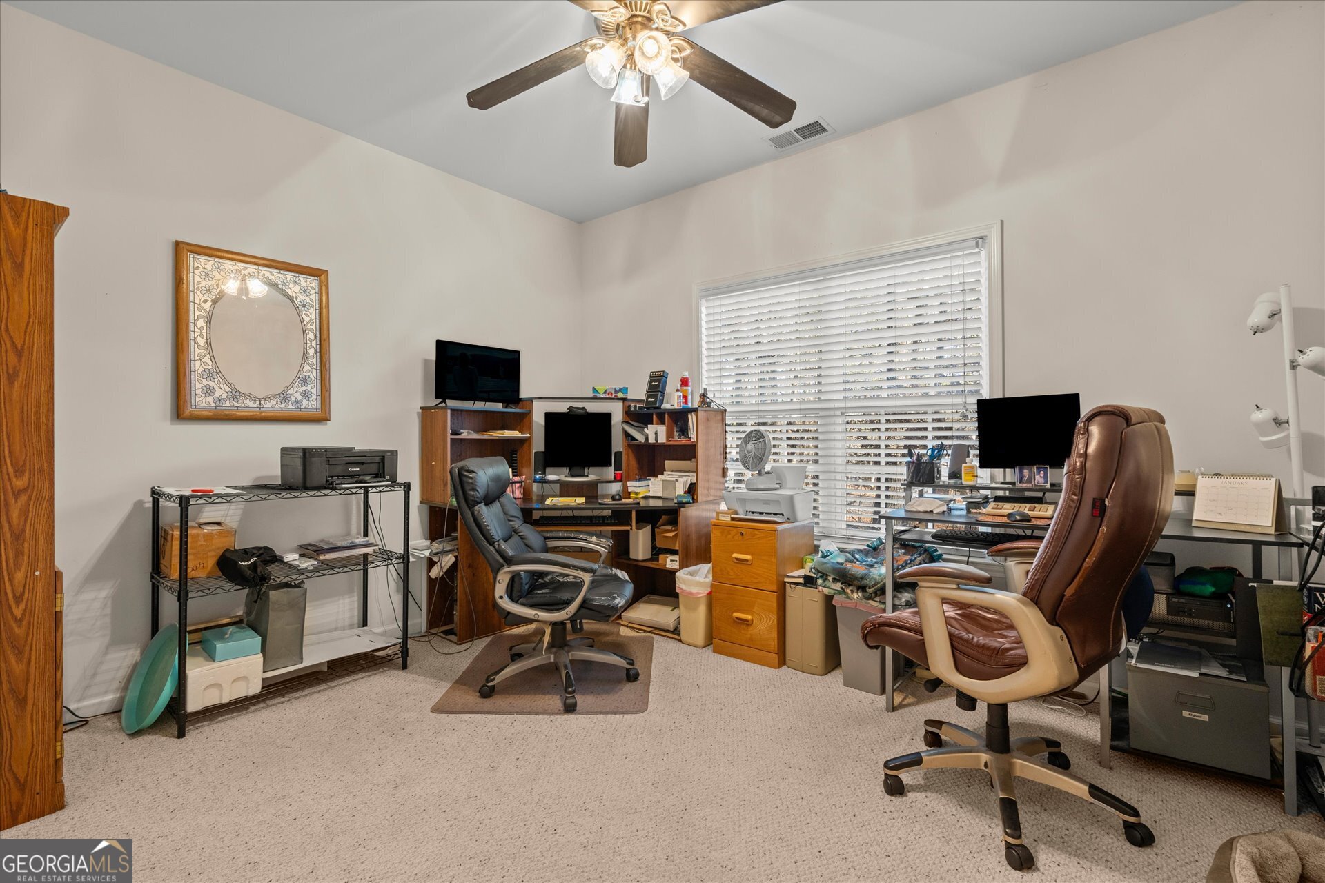 4051 Golfview Court Villa Rica, GA 30180 - Photo 35 of 77 a view of a workspace with furniture and a window