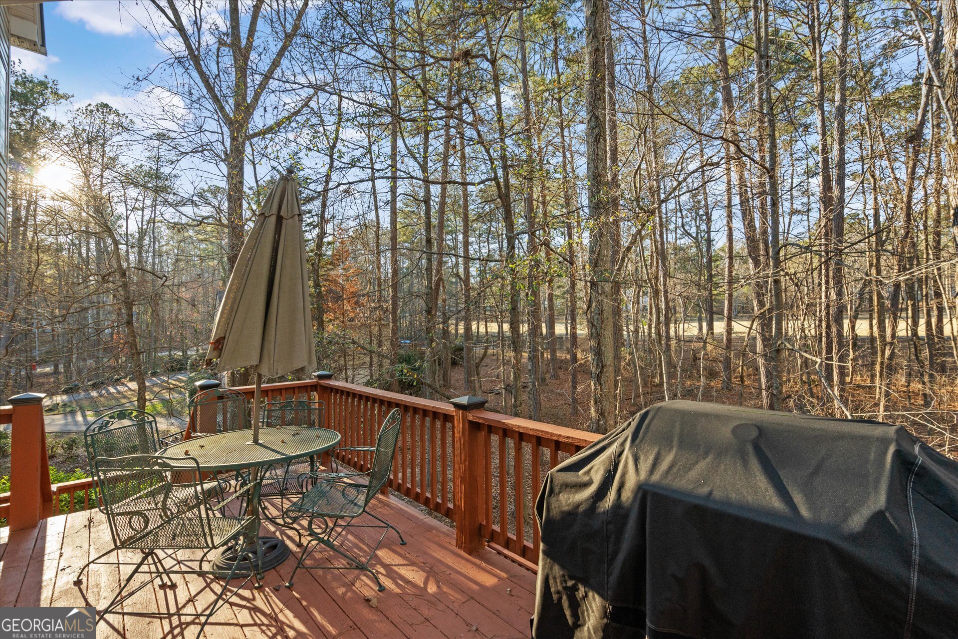4051 Golfview Court Villa Rica, GA 30180 - Photo 36 of 77 a view of balcony with wooden floor and outdoor seating