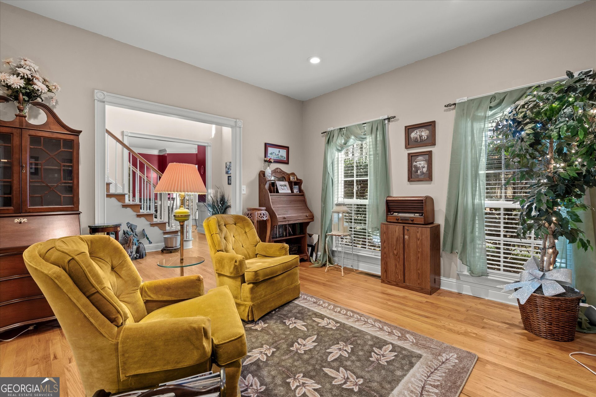 4051 Golfview Court Villa Rica, GA 30180 - Photo 6 of 77 a living room with furniture rug and wooden floor