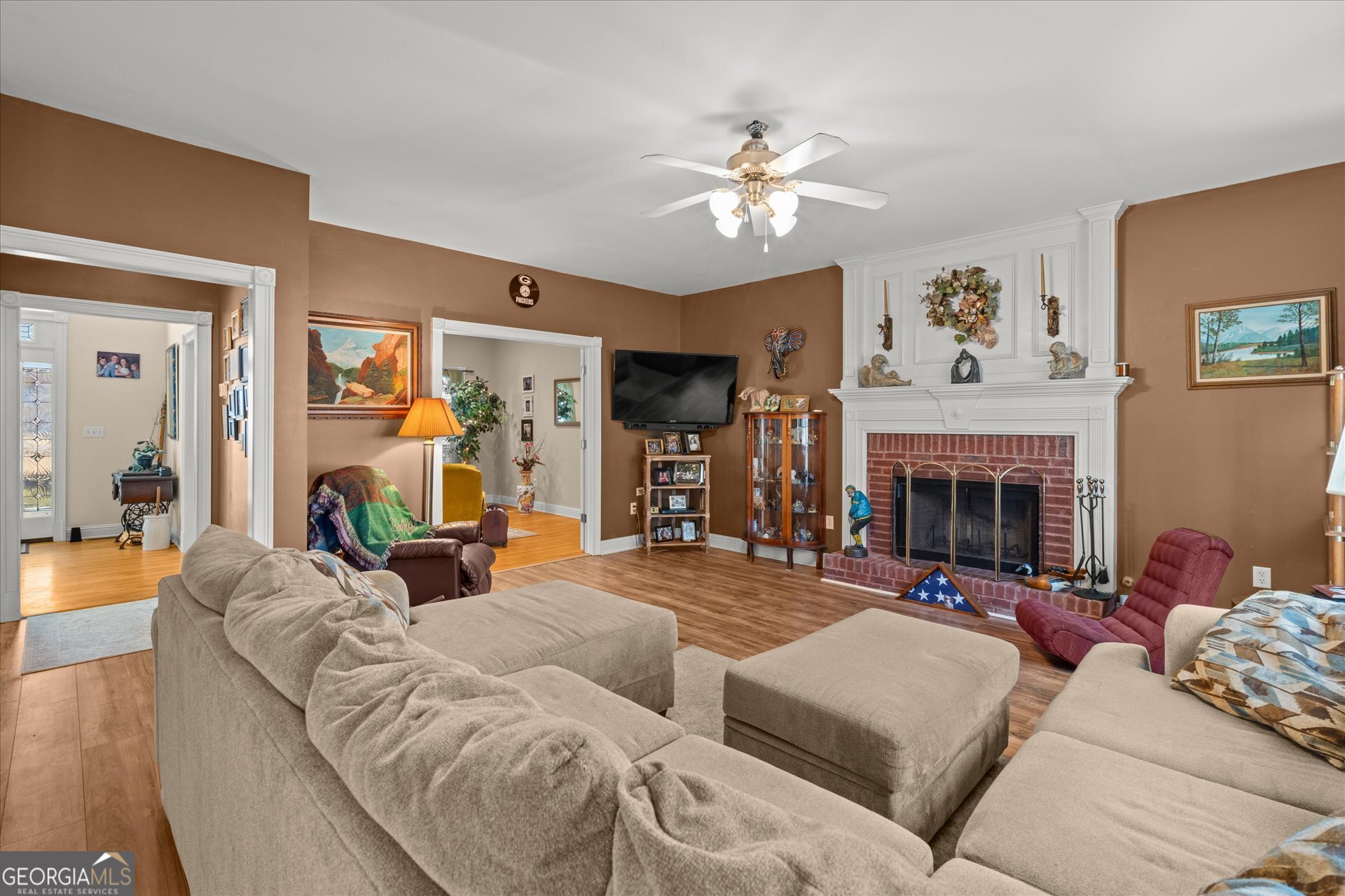 4051 Golfview Court Villa Rica, GA 30180 - Photo 9 of 77 a living room with furniture and a fireplace
