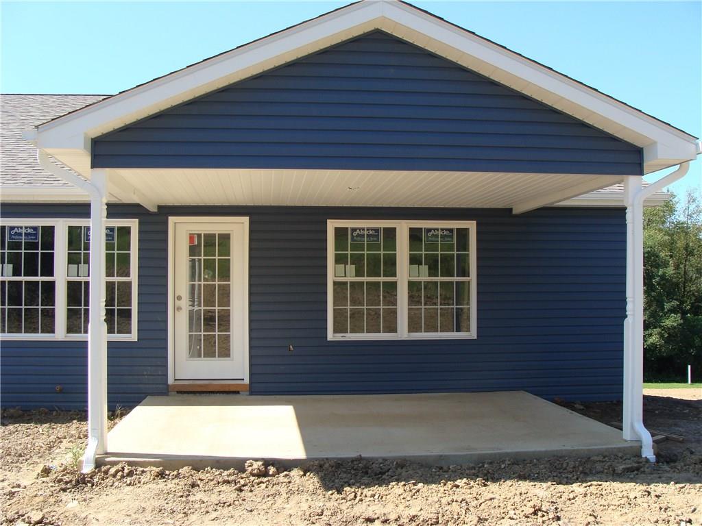 VIEW OF COVERED REAR PORCH.
