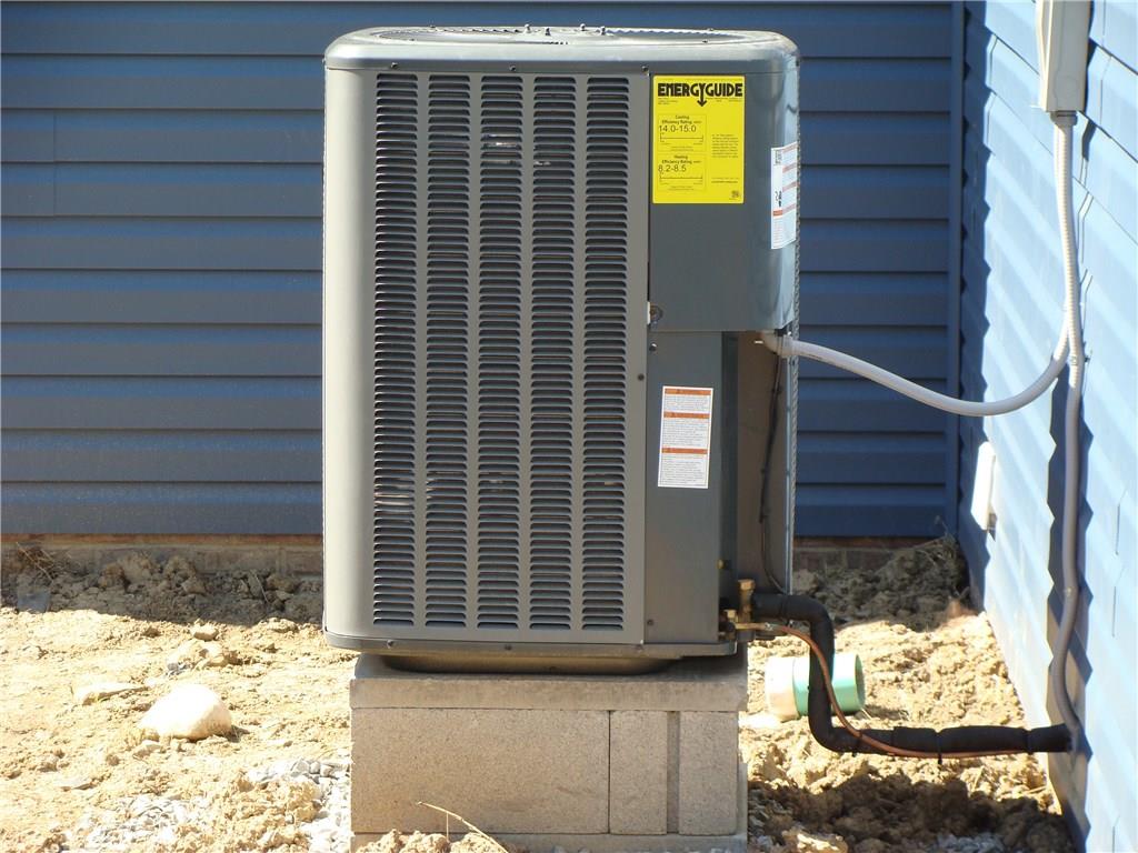 HEAT PUMP AND AIRCONDITIONER.  HEAT PUMP SUPPLIMENTS THE HIGH EFFICIENCY GAS FURNACE.