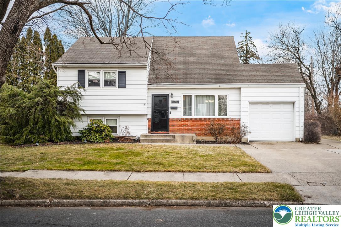 a view of a house with a swimming pool