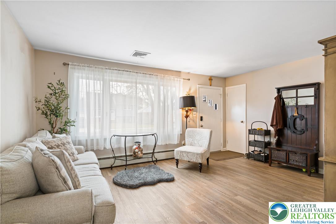 1937 Greenleaf Street Bethlehem, PA 18017 - Photo 14 of 45 a living room with furniture and a large window