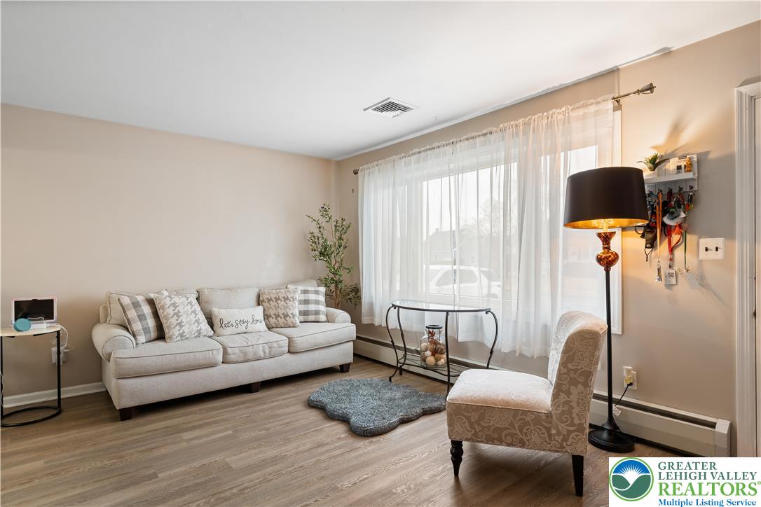 1937 Greenleaf Street Bethlehem, PA 18017 - Photo 15 of 45 a living room with furniture and a large window