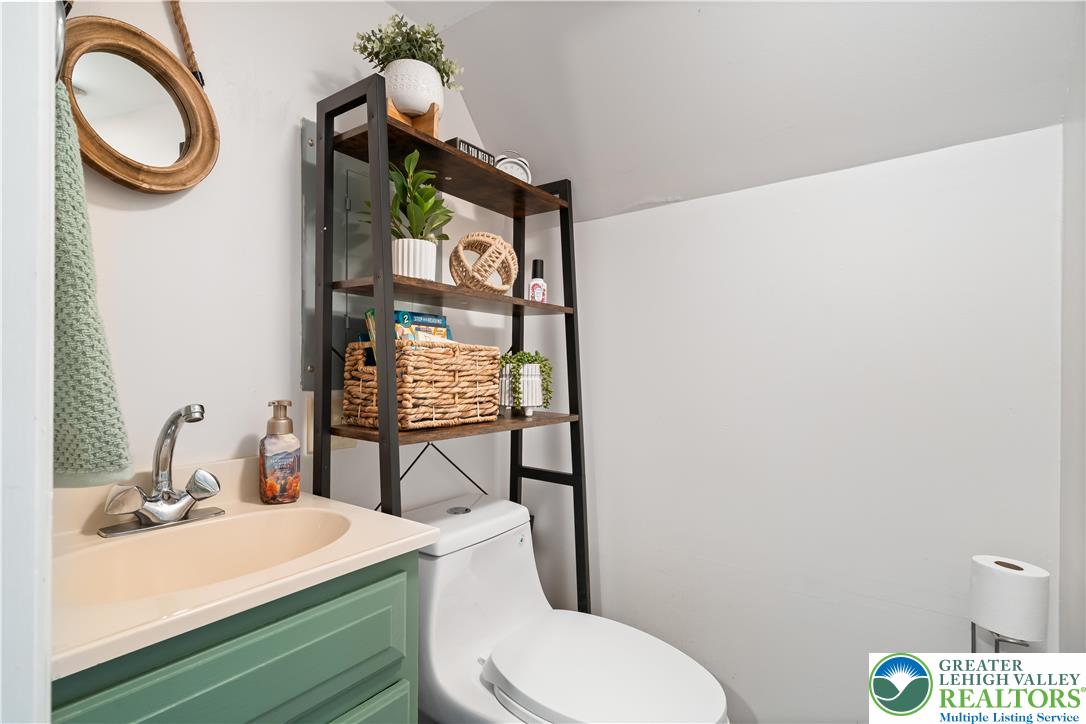 1937 Greenleaf Street Bethlehem, PA 18017 - Photo 26 of 45 a bathroom with a toilet sink and mirror