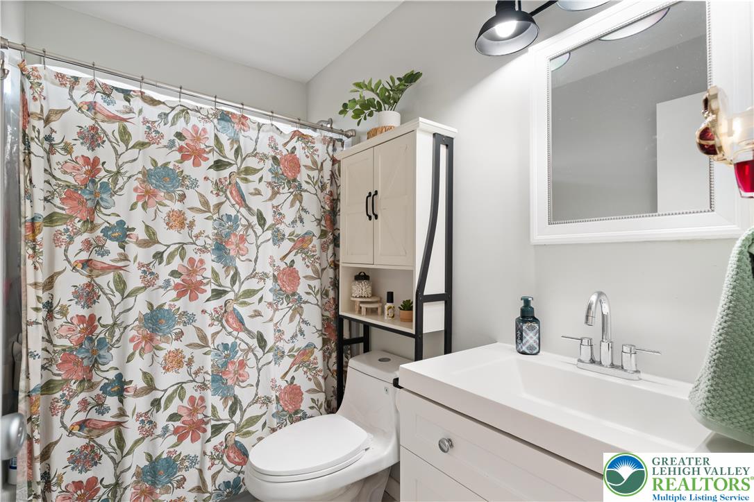 1937 Greenleaf Street Bethlehem, PA 18017 - Photo 29 of 45 a bathroom with a sink toilet and shower