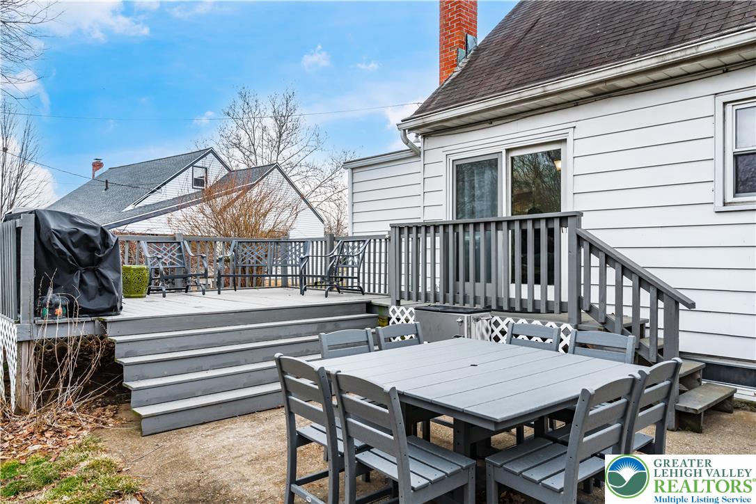 1937 Greenleaf Street Bethlehem, PA 18017 - Photo 38 of 45 a view of a patio with table and chairs with wooden floor and fence