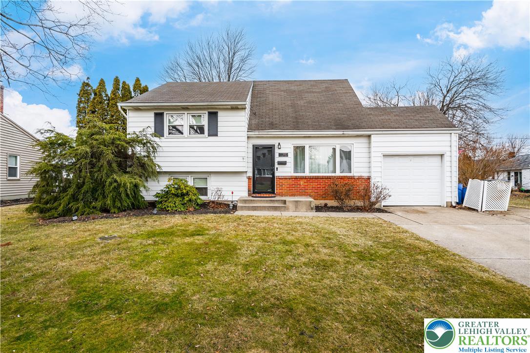 1937 Greenleaf Street Bethlehem, PA 18017 - Photo 5 of 45 a front view of a house with a yard and garage