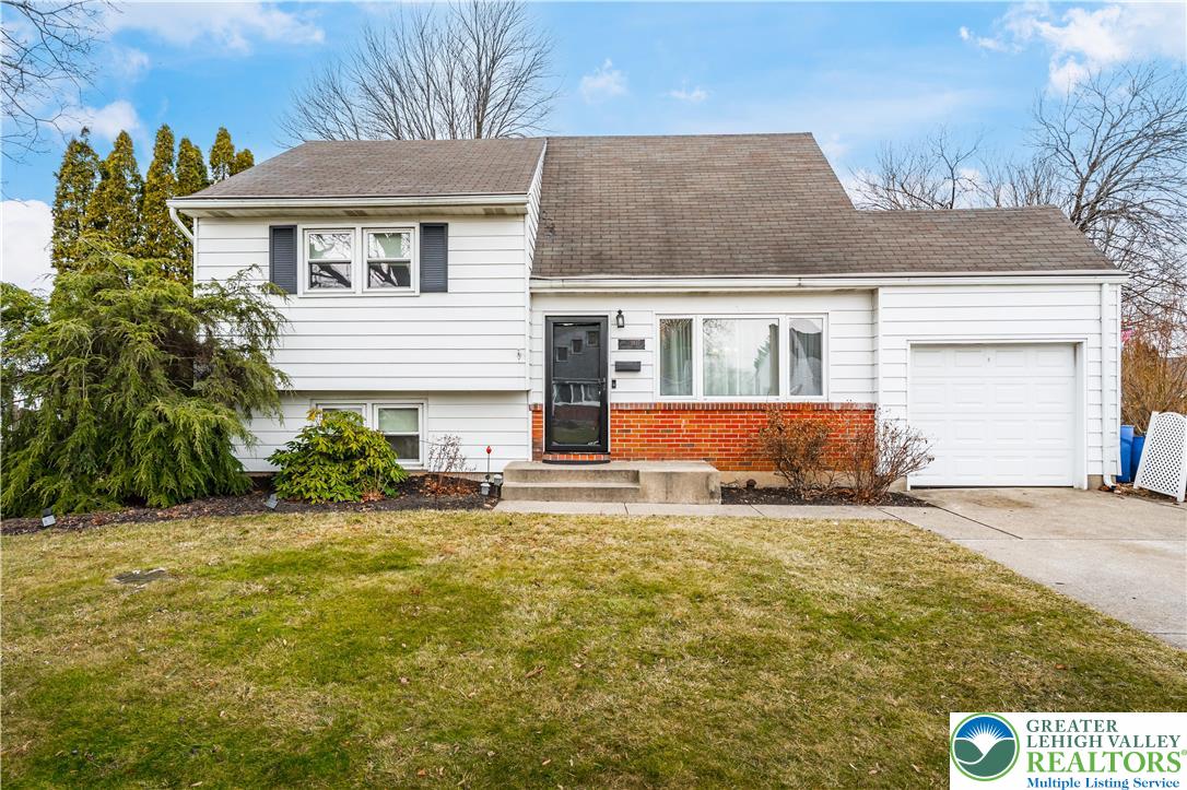 1937 Greenleaf Street Bethlehem, PA 18017 - Photo 6 of 45 a front view of a house with a yard and garage
