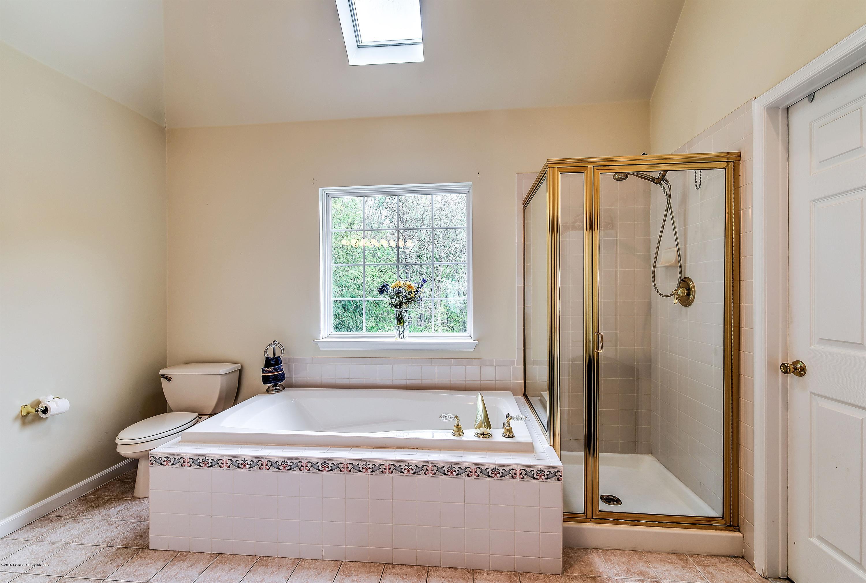 362 Jackson Mills Road Jackson, NJ 08527 - Photo 20 of 34 a spacious bathroom with a tub and shower