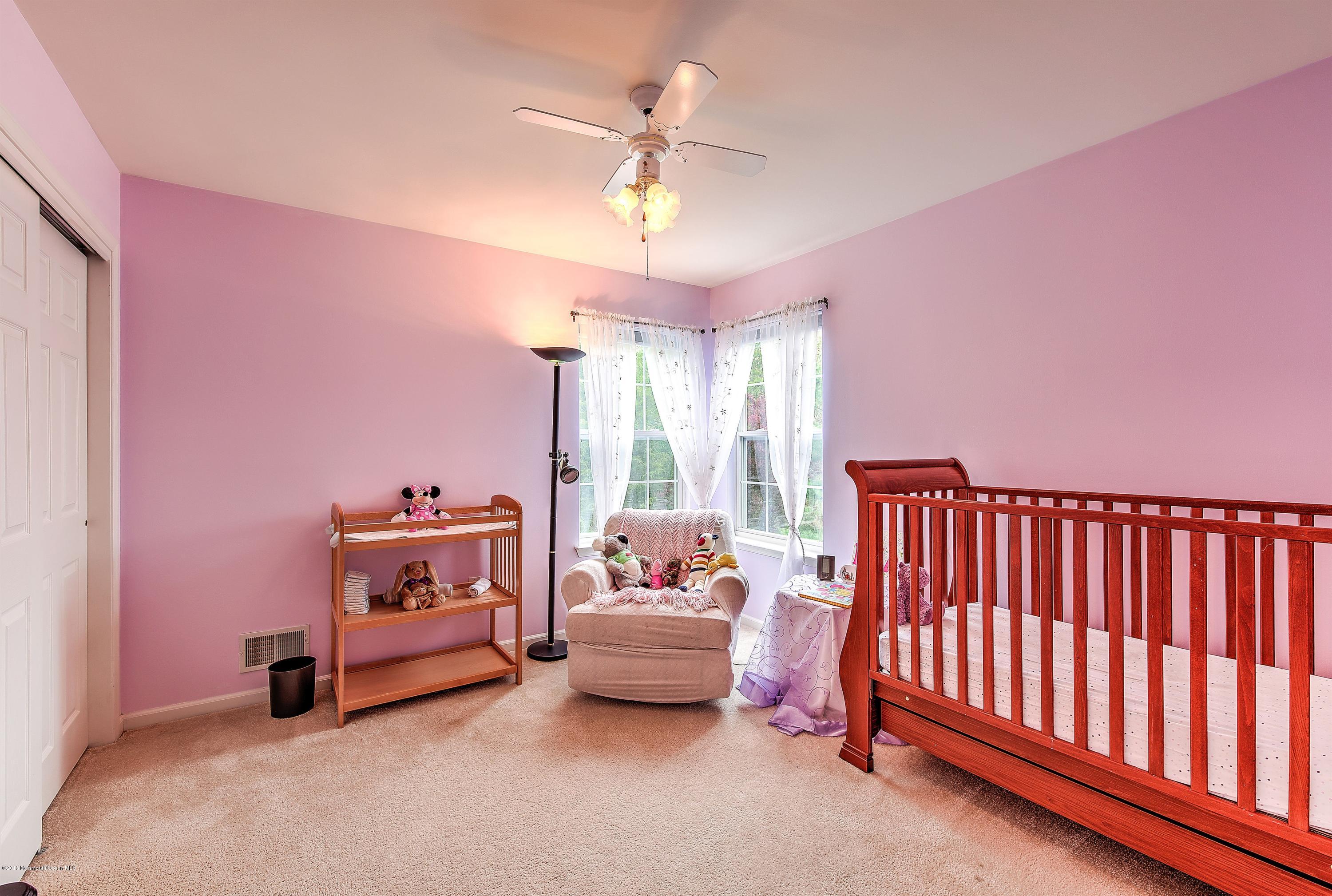 362 Jackson Mills Road Jackson, NJ 08527 - Photo 23 of 34 a bedroom with furniture and a window
