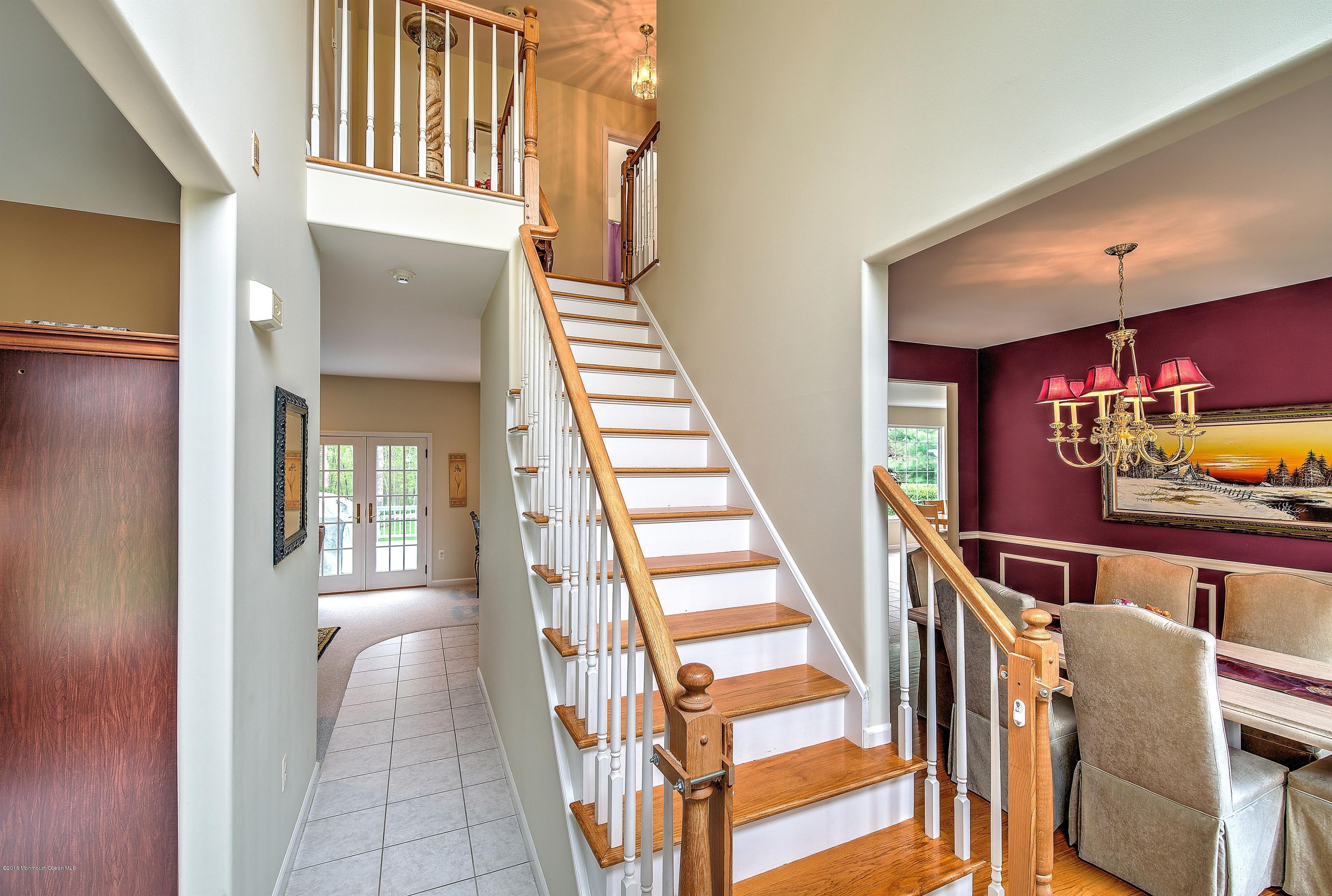 362 Jackson Mills Road Jackson, NJ 08527 - Photo 3 of 34 a view of an entryway with wooden floor and stairs