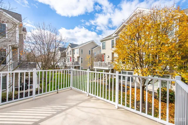 a view of balcony with furniture