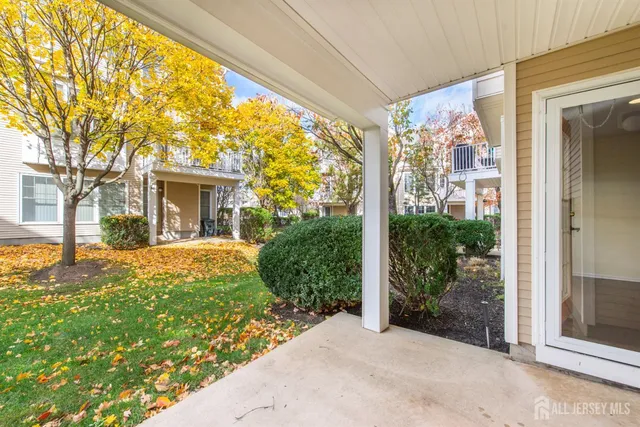 a view of residential houses with outdoor space