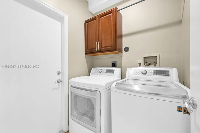 a bathroom with sink bathtub and window