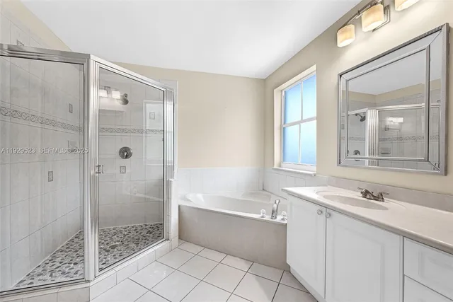 a view of a house with a yard and a porch