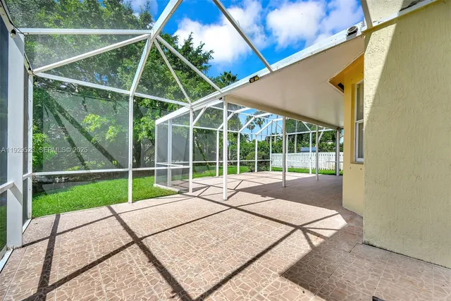 a view of a sign in front of a white house