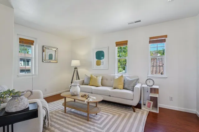 a bedroom with a bed and a chair