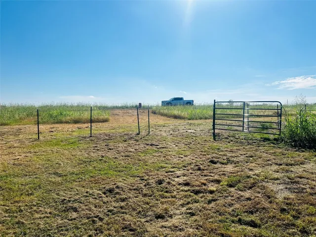 a view of outdoor space with garden and deck