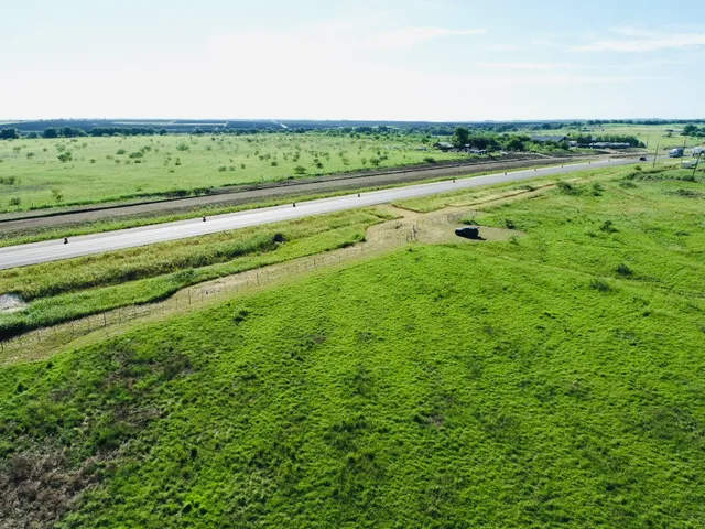 a view of a green field with lots of green space