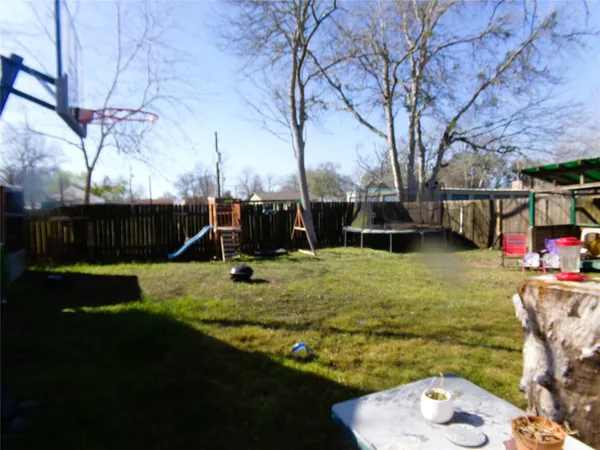a view of a garden with a slide