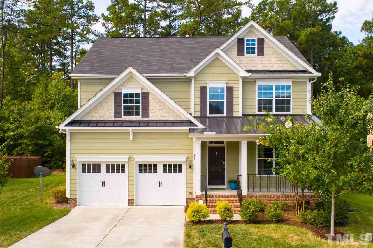 227 Strolling Way Durham, NC 27707 - Photo 1 of 25 a front view of a house with a yard