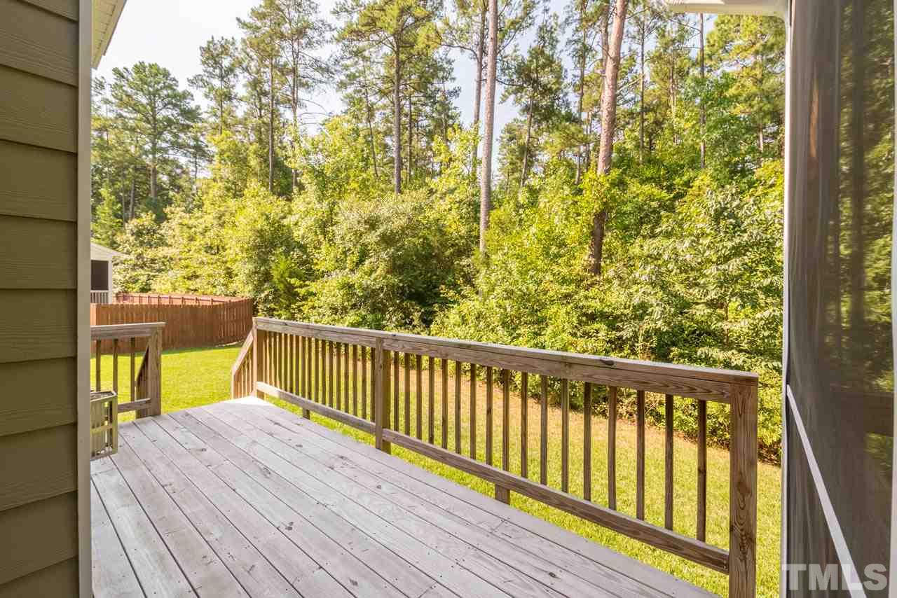 227 Strolling Way Durham, NC 27707 - Photo 24 of 25 a balcony with wooden floor and fence