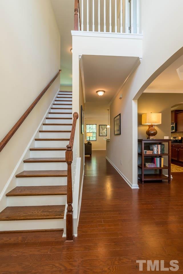 227 Strolling Way Durham, NC 27707 - Photo 3 of 25 a view of entryway and hall with wooden floor