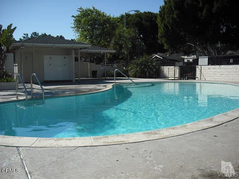 2690 Anchor Avenue Port Hueneme, CA 93041 - Photo 22 of 22 a view of pool with lawn chairs and plants