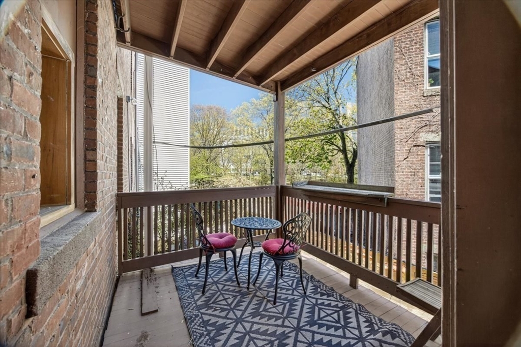 23 Netherlands Road, Unit 1 Brookline, MA 02445 - Photo 16 of 35 a view of a two chairs in the balcony