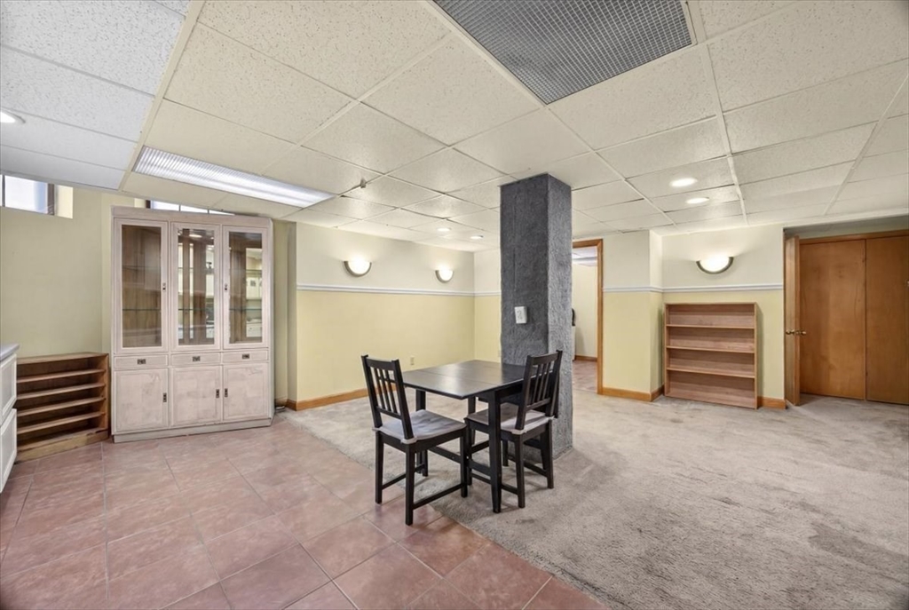 23 Netherlands Road, Unit 1 Brookline, MA 02445 - Photo 21 of 35 a view of a dining room with furniture