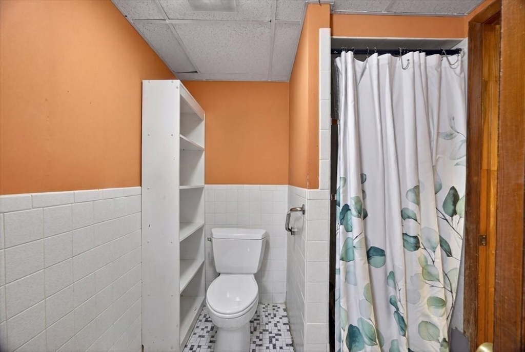 23 Netherlands Road, Unit 1 Brookline, MA 02445 - Photo 22 of 35 a bathroom with a toilet and a shower