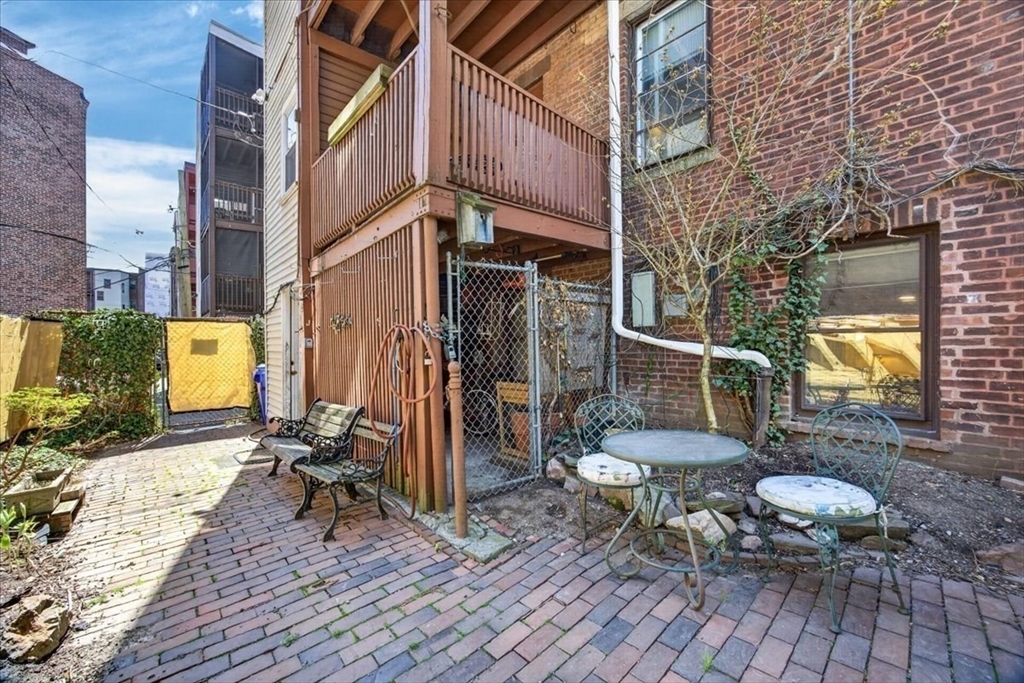 23 Netherlands Road, Unit 1 Brookline, MA 02445 - Photo 32 of 35 a view of outdoor space yard deck and patio
