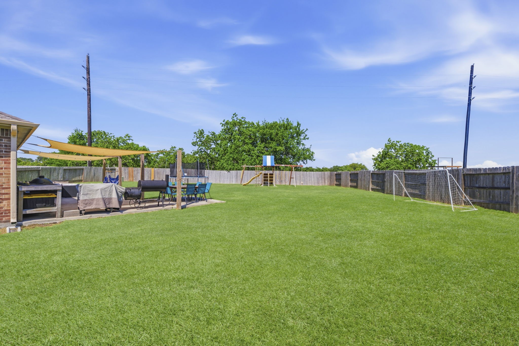 2401 Abbot Brk Drive Rosharon, TX 77583 - Photo 40 of 50 Situated on a premium 13,273-square-foot lot, this property offers an abundance of outdoor space for recreation, entertaining, or creating the backyard oasis of your dreams — including plenty of room for a custom pool.