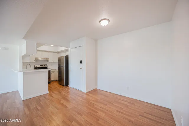 a view of kitchen with wooden floor