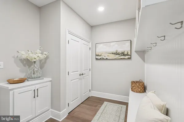 a bedroom with a bed and a table