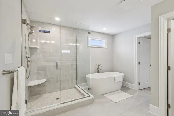 a bathroom with a double vanity sink mirror and double
